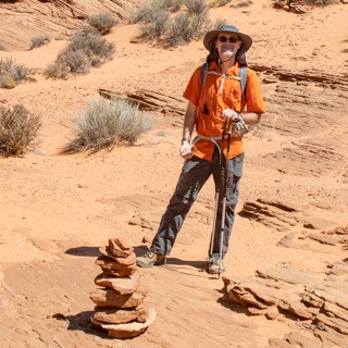 Franz and trail marker in desert
